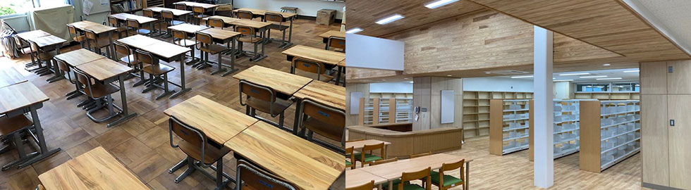 ナラ枯れ材で天板を作った机の並ぶ教室・県産材を使用した学校図書館の内装